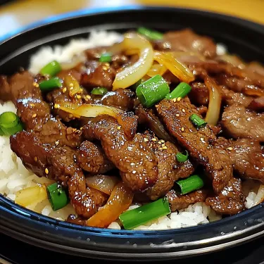 A bowl of meat and vegetables.